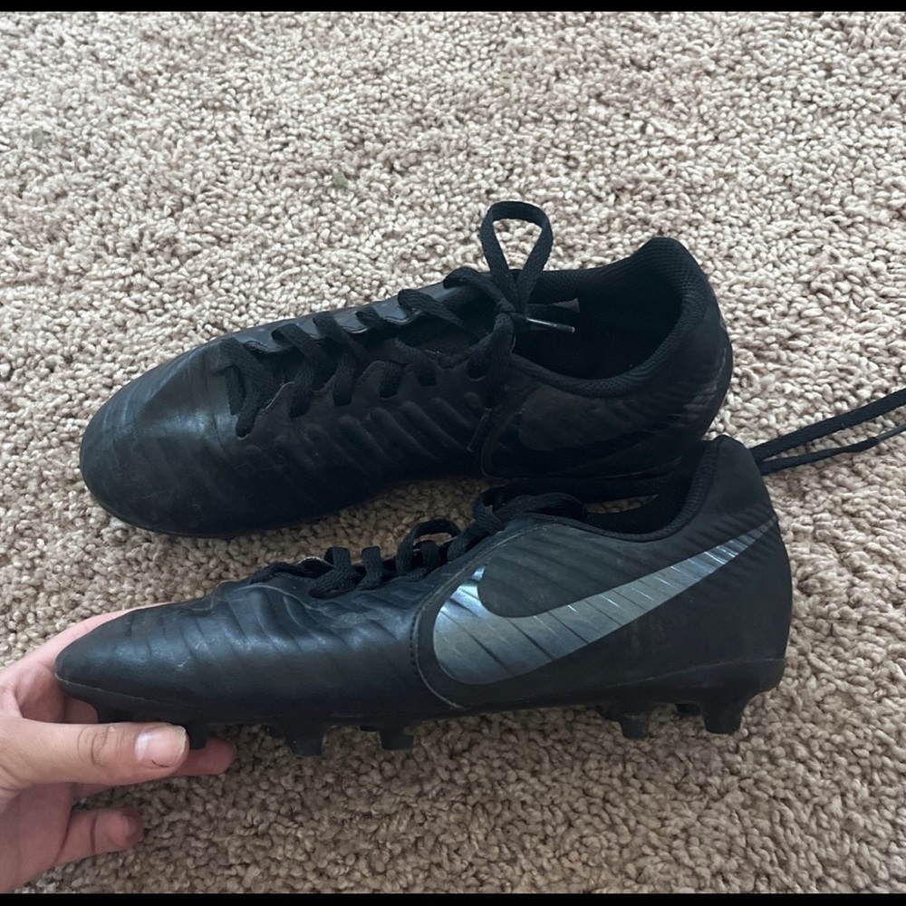 Black Nike soccer cleats